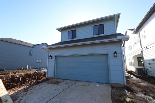 3411 Loam Ln, Richmond, TX 77406 - view of front facade with an attached garage, driveway, and a shingled roof