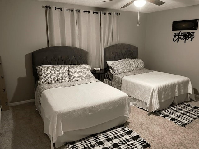 bedroom featuring ceiling fan and carpet floors