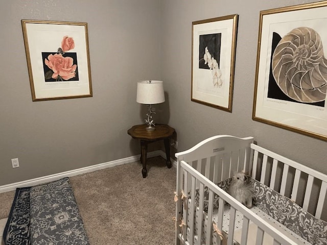 carpeted bedroom with a crib