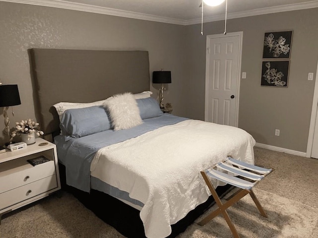 bedroom with carpet floors and ornamental molding