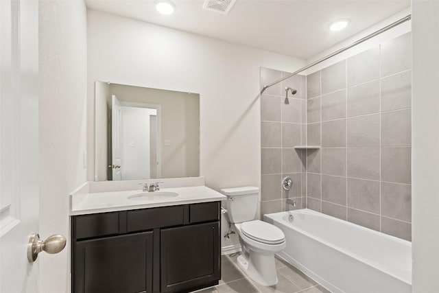 bathroom featuring vanity, tub / shower combination, toilet, tile patterned flooring, and visible vents