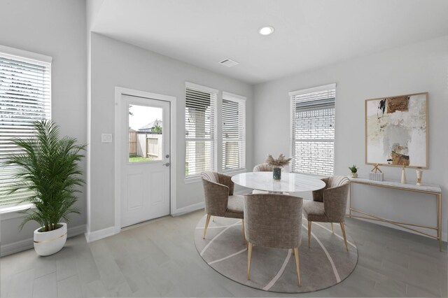 dining area with light wood-type flooring