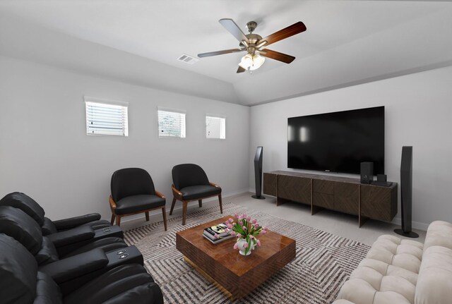 living room featuring light colored carpet, vaulted ceiling, and ceiling fan