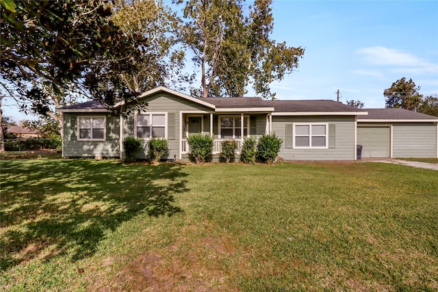 ranch-style home featuring a front yard and a garage