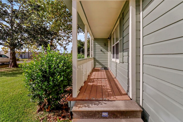 view of property exterior featuring a porch