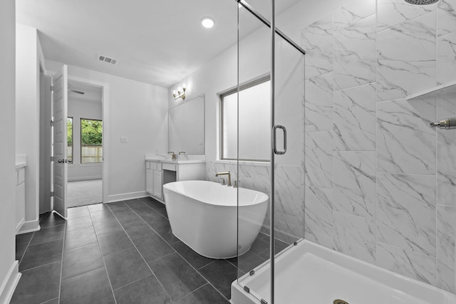 bathroom featuring tile patterned floors, vanity, and independent shower and bath