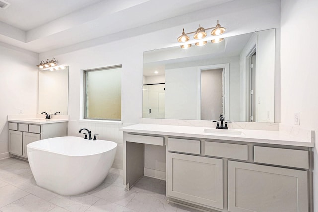 bathroom featuring vanity and plus walk in shower