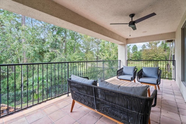 view of patio with outdoor lounge area and ceiling fan