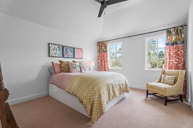 bedroom featuring carpet floors, vaulted ceiling, and ceiling fan