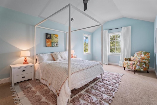 carpeted bedroom featuring ceiling fan and lofted ceiling