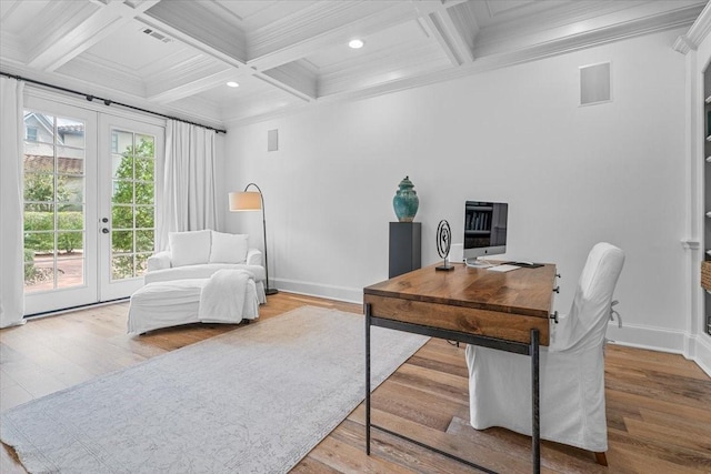 office space with beamed ceiling, light wood-type flooring, and coffered ceiling