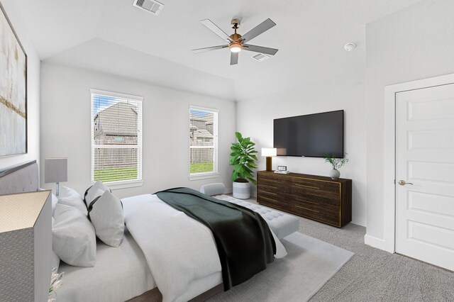 bedroom featuring multiple windows, ceiling fan, light carpet, and lofted ceiling