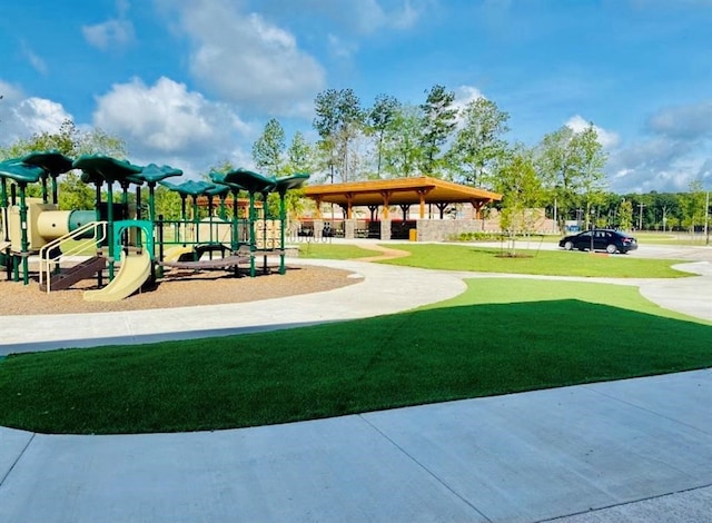 view of playground featuring a yard