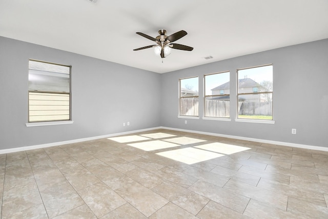 spare room featuring ceiling fan