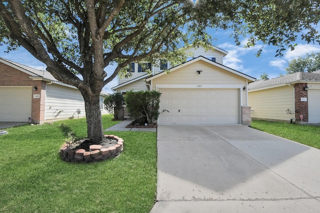 view of front facade featuring a front yard and a garage