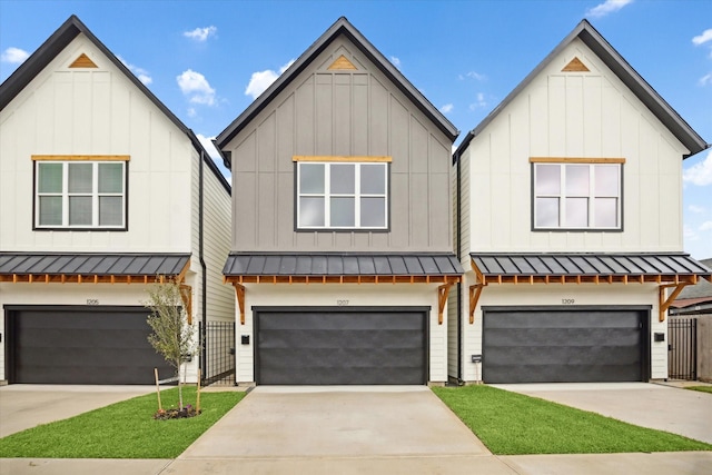 modern farmhouse featuring a garage