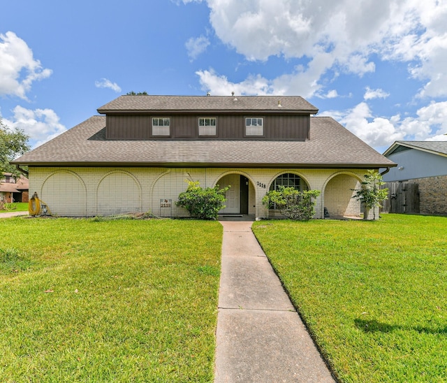 view of front of home with a front yard