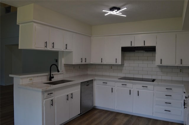 kitchen featuring sink, stainless steel dishwasher, black electric cooktop, white cabinetry, and kitchen peninsula