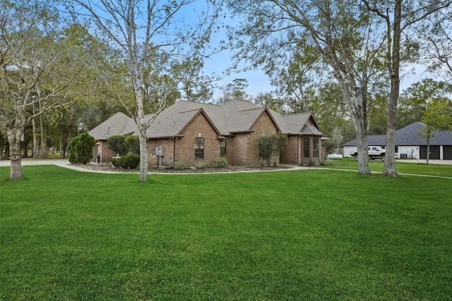 view of front of home with a front lawn