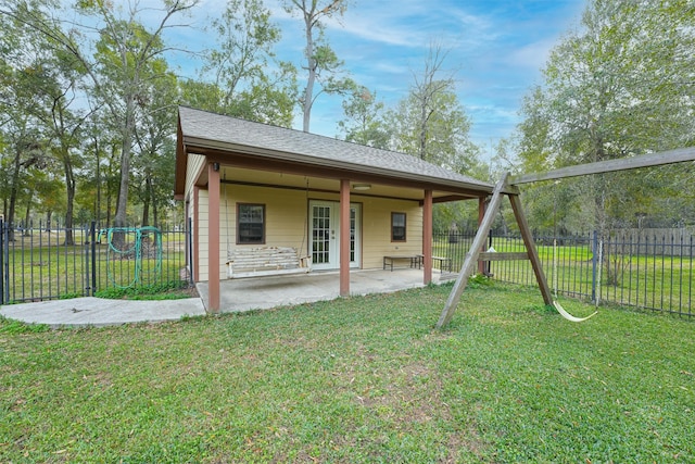 exterior space featuring a yard and a patio