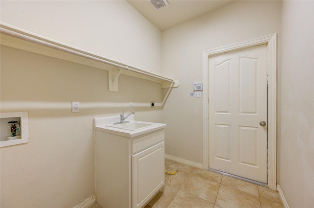 washroom featuring sink, hookup for a washing machine, and electric dryer hookup