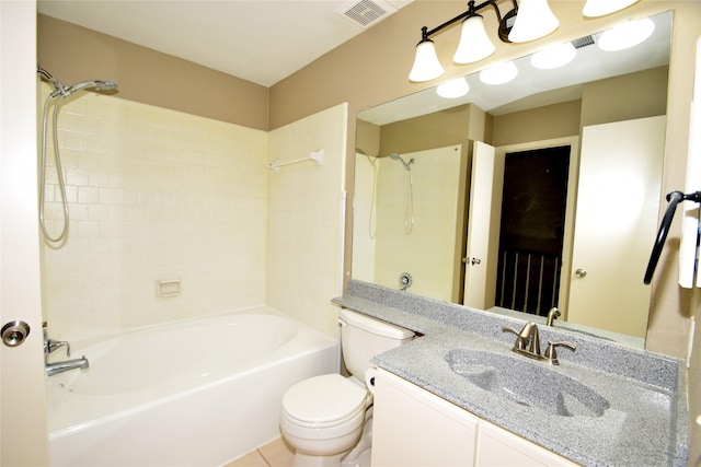 full bathroom featuring tile patterned flooring, vanity, tiled shower / bath combo, and toilet