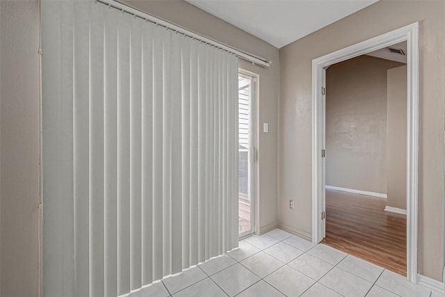 view of tiled spare room