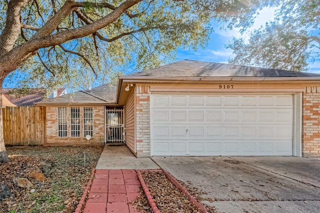 ranch-style home with a garage