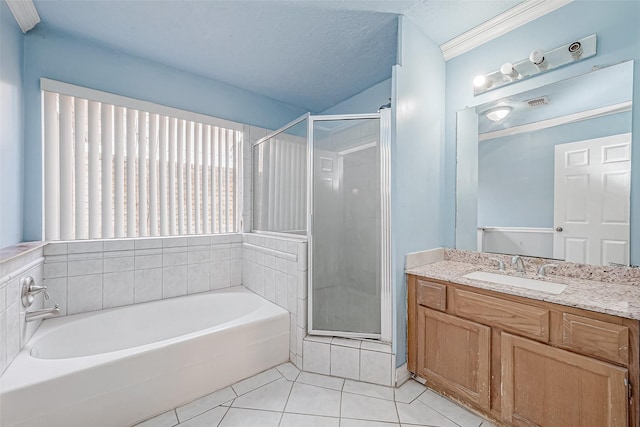 bathroom with crown molding, vanity, plus walk in shower, a textured ceiling, and tile patterned floors