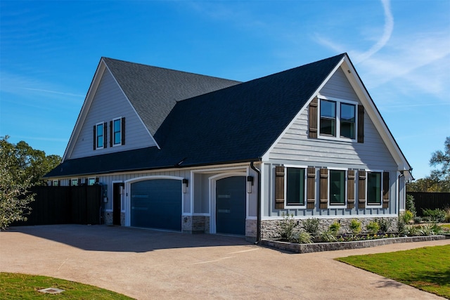 view of front of home featuring covered porch and a garage