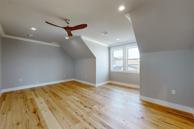 bonus room with ceiling fan, vaulted ceiling, and light hardwood / wood-style flooring