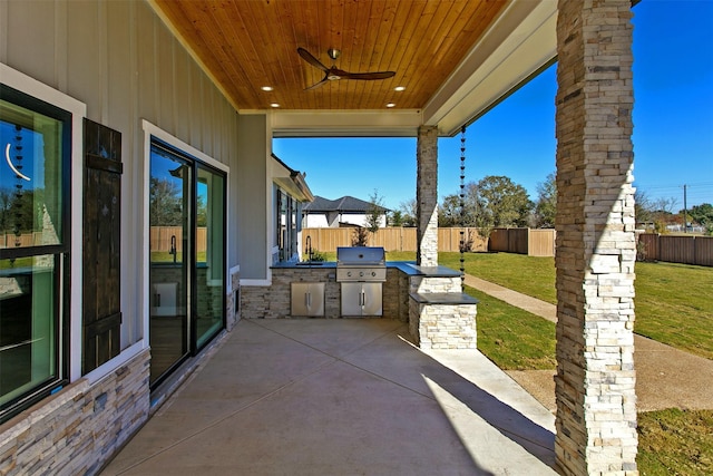 view of patio / terrace featuring grilling area, area for grilling, and ceiling fan