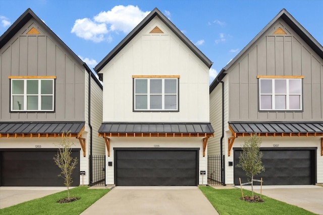 modern farmhouse style home featuring a garage