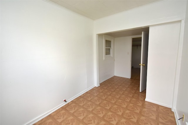 corridor featuring crown molding and light parquet flooring