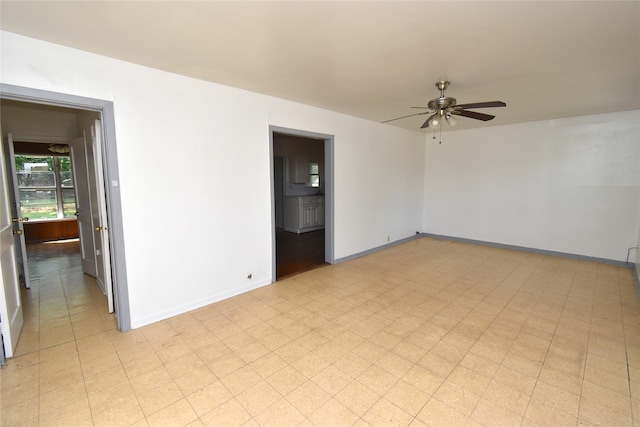 spare room featuring ceiling fan