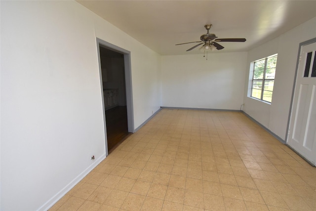 spare room featuring ceiling fan