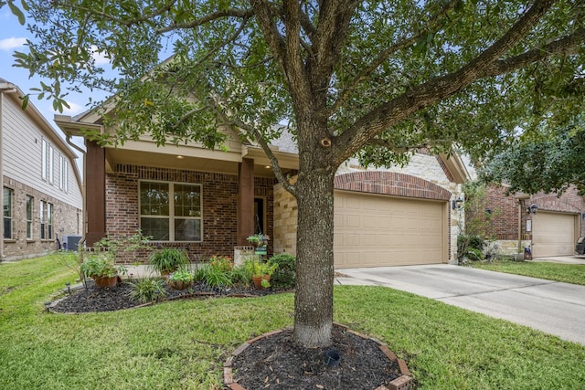 view of front of property with a front yard, a garage, and central air condition unit