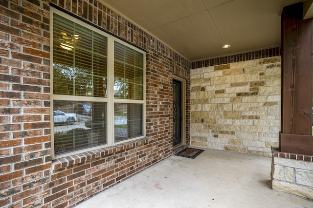 entrance to property featuring covered porch