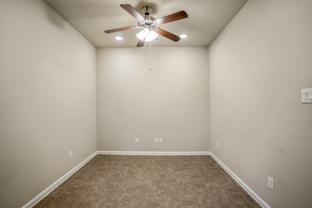 empty room featuring ceiling fan