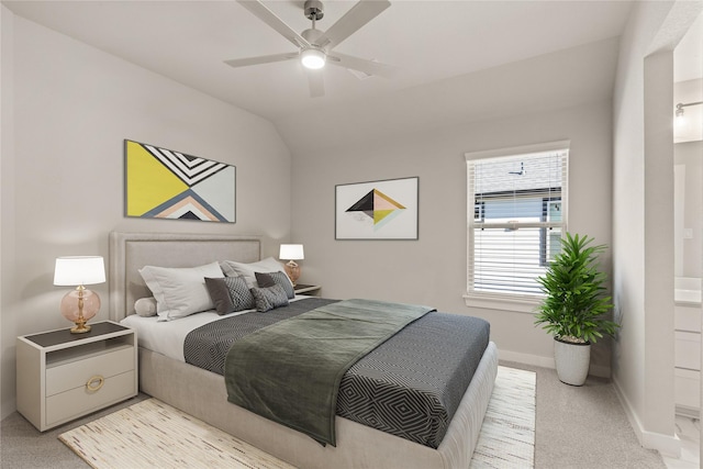 carpeted bedroom featuring ceiling fan and lofted ceiling