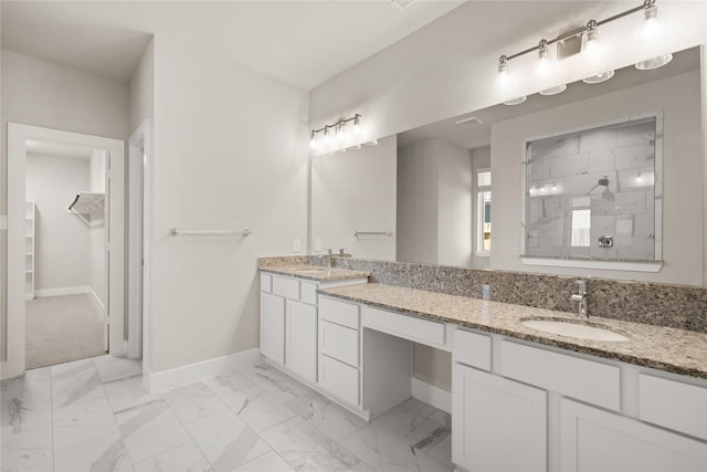 bathroom with vanity and walk in shower