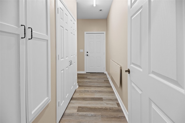 hallway featuring light wood-type flooring