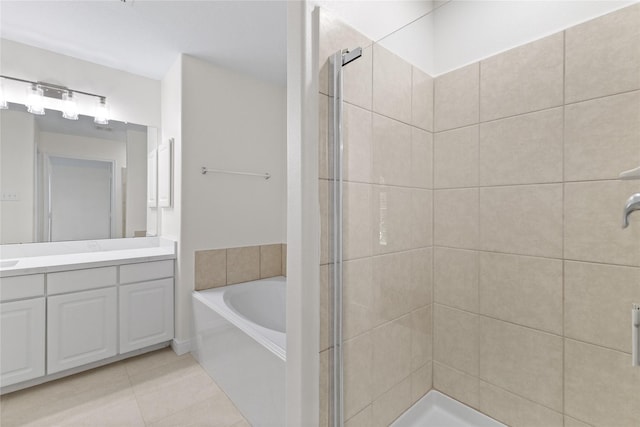 bathroom featuring tile patterned flooring, vanity, and independent shower and bath