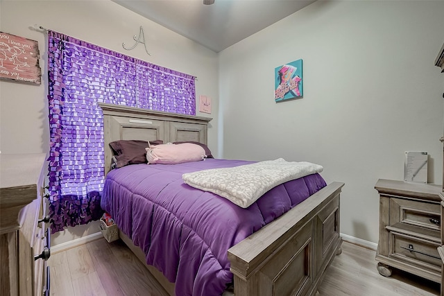 bedroom with light wood-type flooring