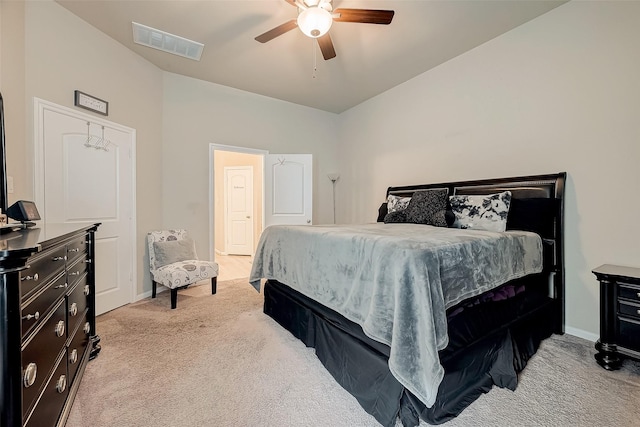 bedroom with ceiling fan and light colored carpet