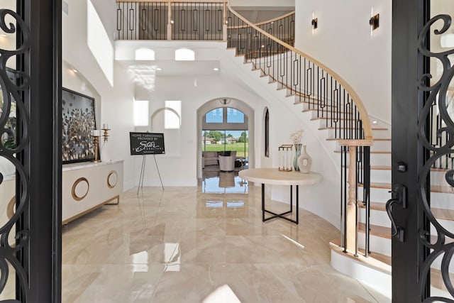 entrance foyer featuring a high ceiling