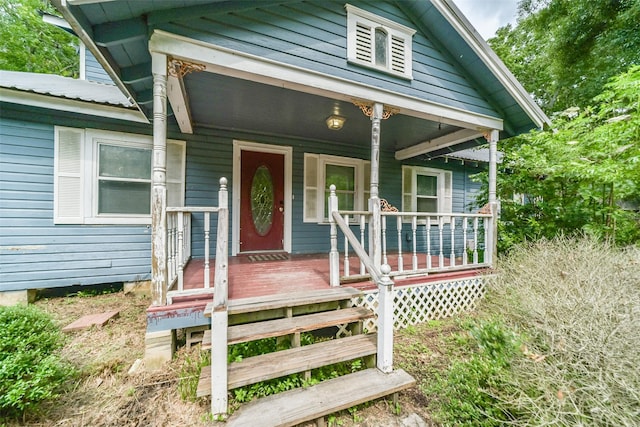 entrance to property with covered porch