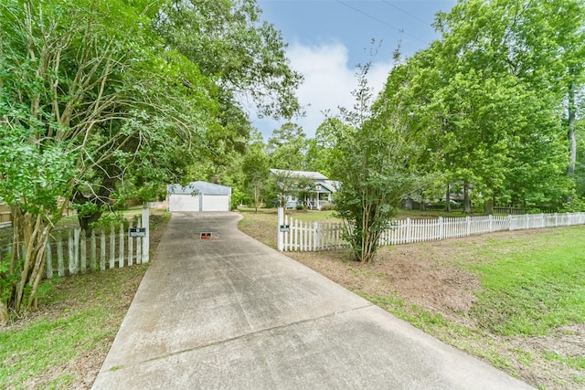 exterior space featuring a yard and an outdoor structure