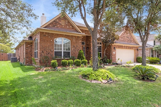 view of front of house featuring cooling unit, a garage, and a front lawn