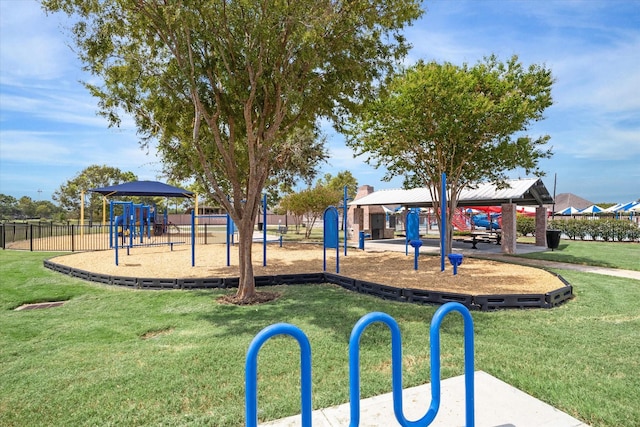 view of jungle gym with a lawn